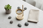 Brass incense burner minimalist flat lay with linen and stones